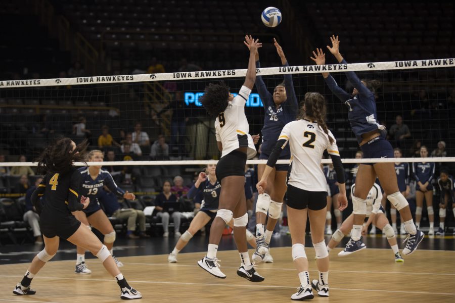 Iowa middle blocker Amiya Jones spikes the ball during a volleyball game against Penn State on Nov. 1, 2019 at Carver Hawkeye Arena. The Hawkeyes fell to the Lions, 0-3. 