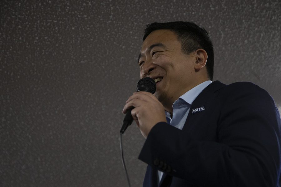 2020 Democratic hopeful Andrew Yang speaks at the opening of his Iowa City campaign office on Nov. 2, 2019. Yang wore a pin highlighting his “MATH” slogan, joking, “wouldn’t it be crazy if I was actually really bad at math?”