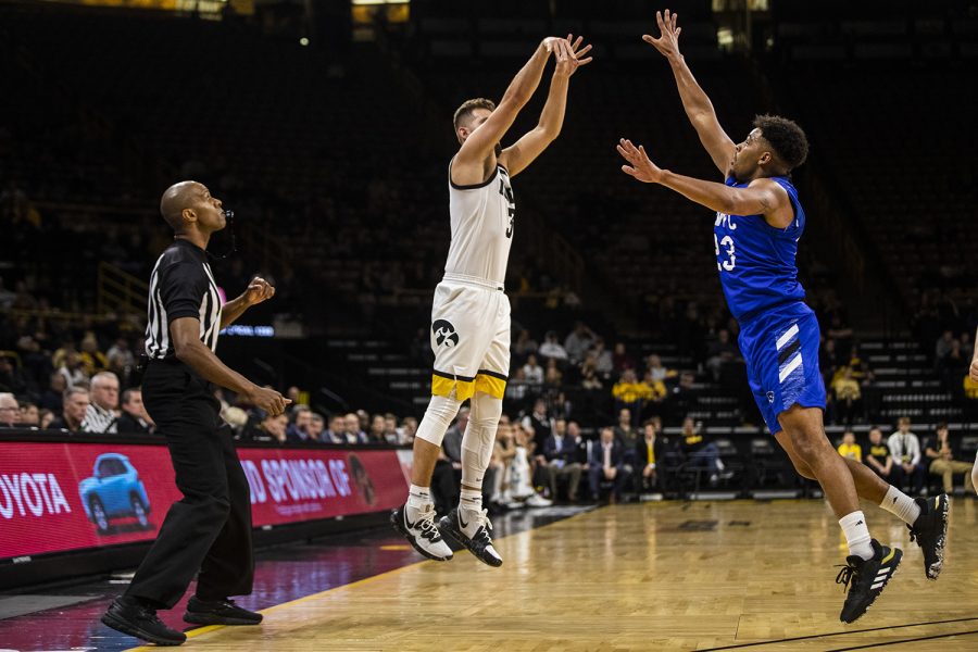 Iowa guard Jordan Bohannon shoots a 3-pointer during the mens basketball game against Lindsey Wilson College at Carver-Hawkeye Arena on Monday, November 4, 2019. The Hawkeyes defeated the Blue Raiders 96-58. Bohannon made his first attempted 3-pointer of the season. 