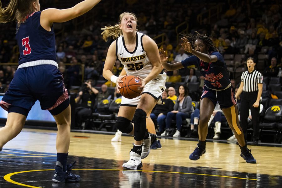 Iowa+center+Monika+Czinano+prepares+to+shoots+the+ball+during+the+womens+basketball+game+against+Florida+Atlantic+on+Thursday%2C+November+7%2C+2019.+The+Hawkeyes+defeated+the+Owls+85-53.+Czinano+scored+14+points+throughout+the+game.