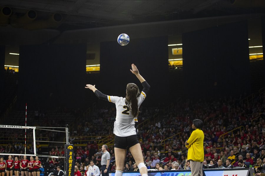Right side hitter Courtney Buzzerio serves the ball during the Iowa and Nebraska volleyball game. The Huskers defeated the Hawkeyes in three sets on November 9, 2019, at Carver-Hawkeye Arena. 
