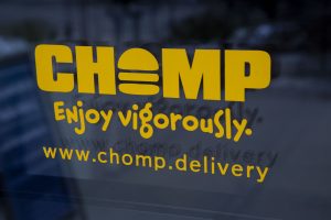 A CHOMP sticker is seen on the door of Mesa on Thursday, Nov. 14, 2019. 
