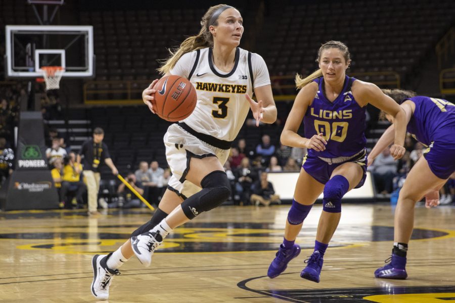 Iowa guard Makenzie Meyer dribbles to shoot a basket during a Women’s basketball game between Iowa and North Alabama at Carver Hawkeye Arena on Thursday, Nov. 14, 2019. The Hawkeyes defeated the Lions, 86-81.