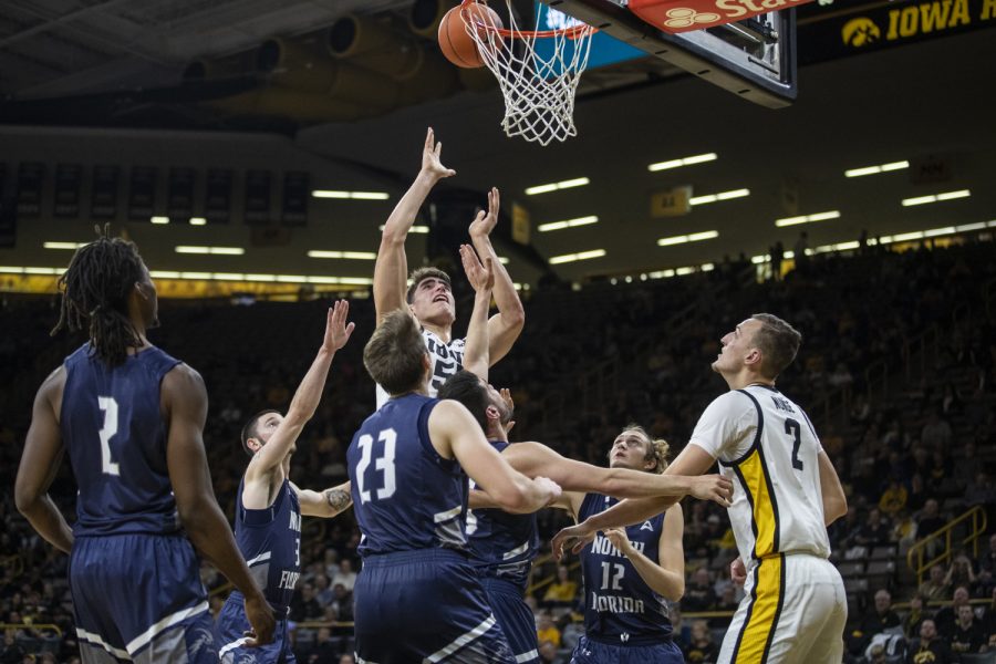 Iowa center Luka Garza shoots during the Iowa Men’s basketball vs. The University of North Florida in Carver-Hawkeye Arena on Thursday, Nov. 21, 2019. The Hawkeyes defeated the Osprey 83-68.