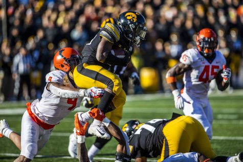 Iowa running back Tyler Goodson carries the ball during the football game against Illinois on Saturday, November 23, 2019. The Hawkeyes defeated the Fighting Illini 19-10. Goodson averaged 1.8 yards per carry during the game.