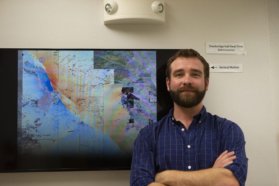 William Barnhart is photographed on Tuesday, November 5, 2019 next to his data. Barnhart took part in the research study on the Garlock Fault in Southern California. (Raquele Decker/The Daily Iowan)