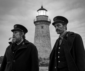 Willem Dafoe and Robert Pattinson in "The Lighthouse." (Eric Chakeen/A24/TNS)