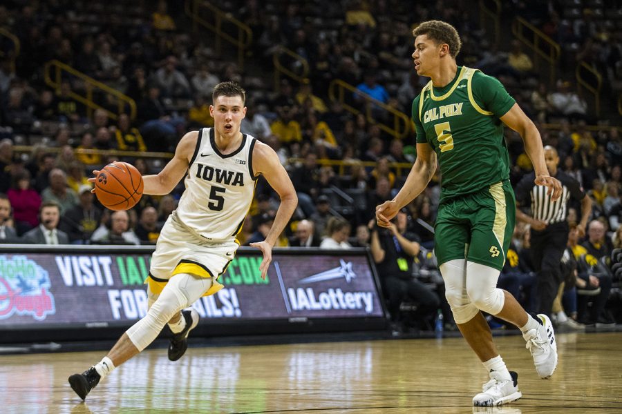 Iowa guard CJ Fredrick drives the ball during the mens basketball game against Cal Poly at Carver-Hawkeye Arena on Sunday, November 24, 2019. The Hawkeyes defeated the Mustangs 85-59.