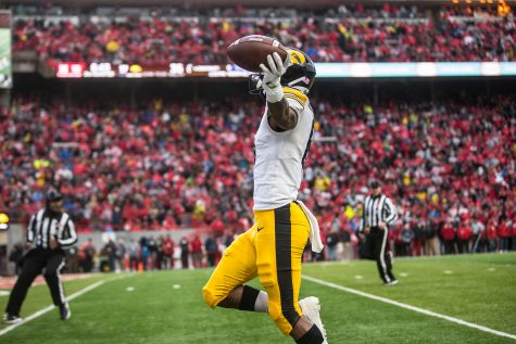 Iowa wide receiver Ihmir Smith-Marsette carries the ball into the end zone during the game against Nebraska on Friday, November 29, 2019. Smith-Marsette received one pass for a total of twenty-two yards. The Hawkeyes defeated the Corn Huskers 27-24. 