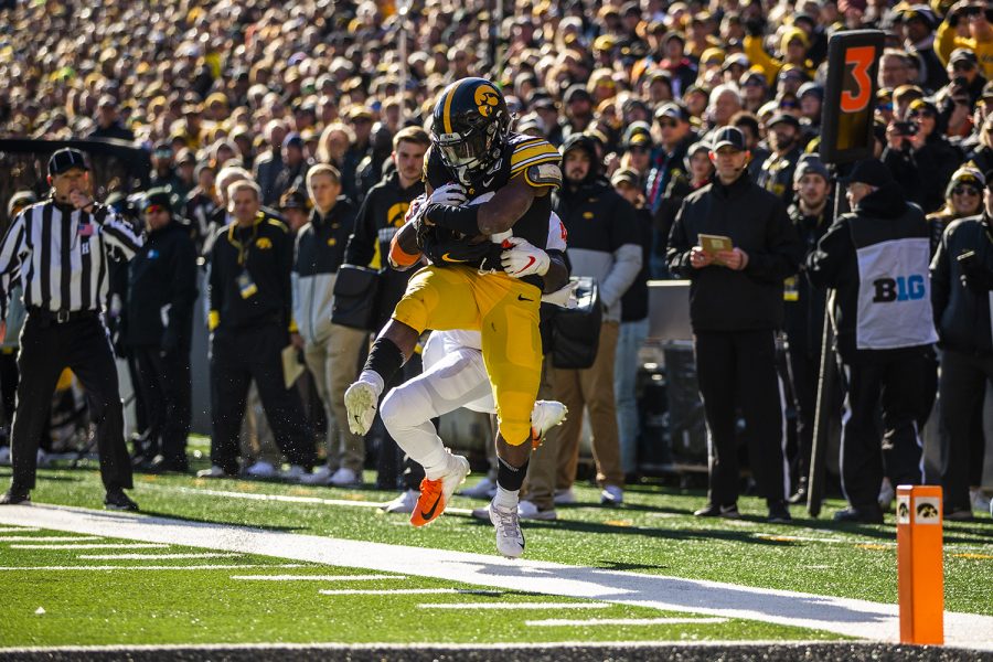 Iowa running back Tyler Goodson catches a pass during the football game against Illinois on Saturday, November 23, 2019.  (Katina Zentz/The Daily Iowan)
