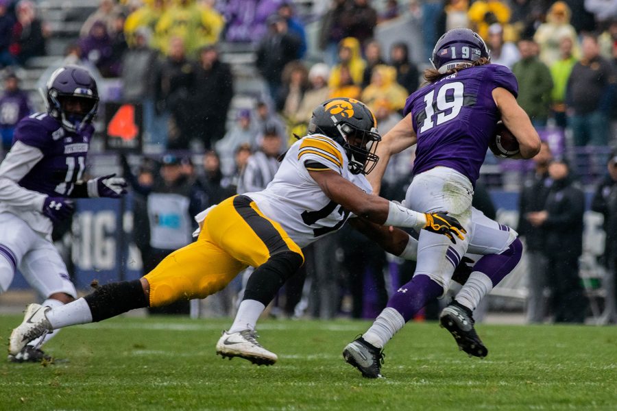 Iowa defensive back Devonte Young makes a tackle during a game against Northwestern at Ryan Field on Saturday, October 26, 2019. The Hawkeyes defeated the Wildcats 20-0. (Megan Nagorzanski/The Daily Iowan)