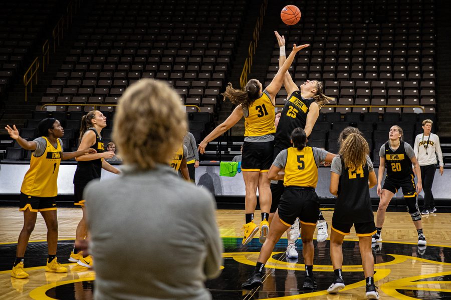 Iowa head coach Lisa Bluder watches a tip-off during an Iowa women's basketball practice at Carver-Hawkeye Arena on Thursday, Oct. 24, 2019. 