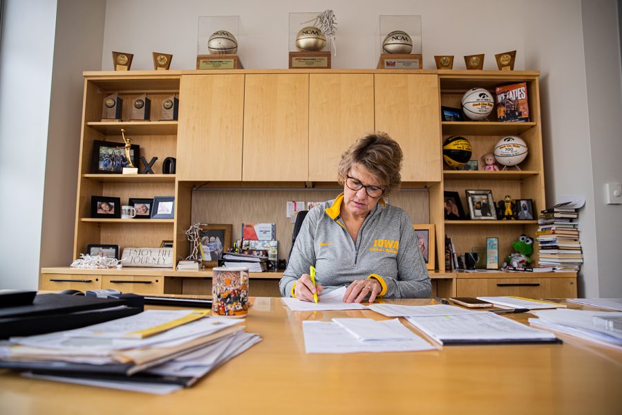 Iowa head coach Lisa Bluder works in her office at Carver-Hawkeye Arena on Oct. 24. 