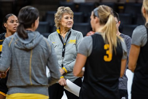 Iowa head coach Lisa Bluder leads a team huddle during an Iowa womens basketball practice at Carver-Hawkeye Arena on Oct. 24. 