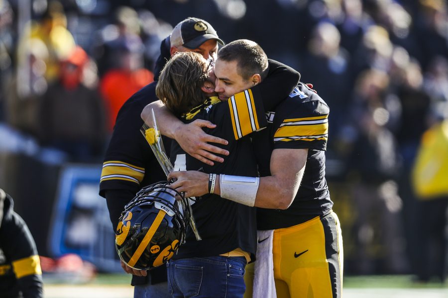 Iowa+quarterback+Nate+Stanley+hugs+his+mother%2C+Donita%2C+during+the+football+game+against+Illinois+on+Saturday%2C+November+23%2C+2019.+The+Hawkeyes+defeated+the+Fighting+Illini+19-10.+%28Katina+Zentz%2FThe+Daily+Iowan%29