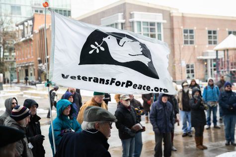 People attend a Veterans Day Rally at the Ped Mall on Monday, November 11, 2019. 