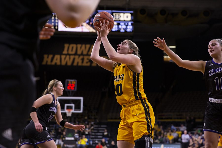 Iowa Guard Kate Martin sets up for a shot during a Womens basketball exhibition game between the University of Iowa and Winona State University at Carver Hawkeye Arena on November 3, 2019. The Hawkeyes beat the Warriors with a score of  98-53. 