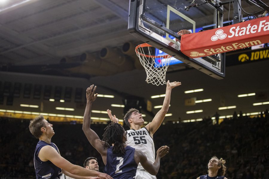 Iowa center Luka Garza goes for a lay-up during the Iowas  game against The University of North Florida in Carver-Hawkeye Arena on Thursday, Nov. 21, 2019. The Hawkeyes defeated the Osprey 83-68.  