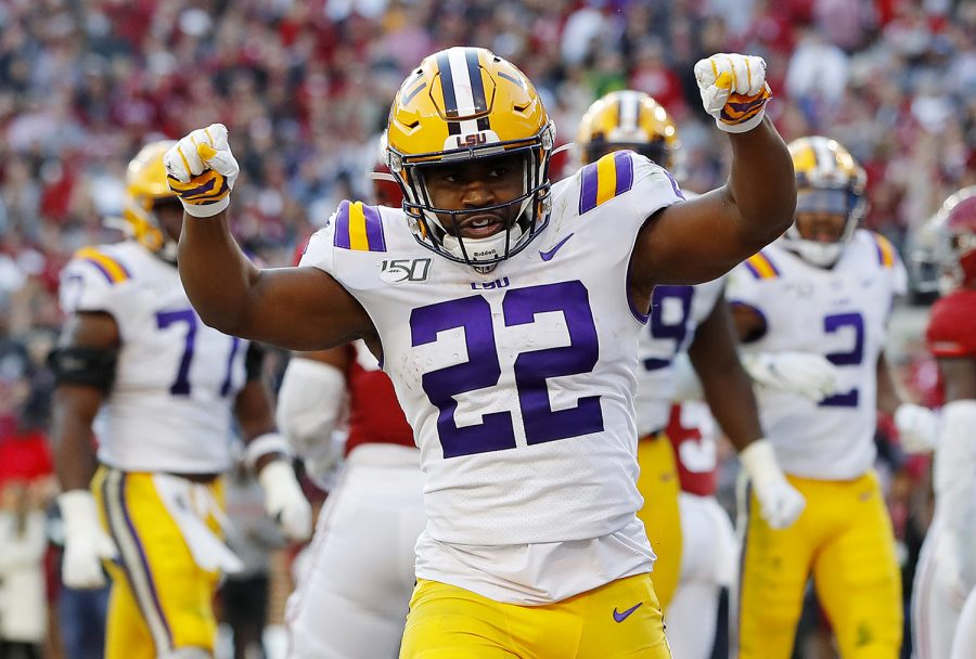 Clyde Edwards-Helaire #22 of the LSU Tigers celebrates after rushing for a 1-yard touchdown during the second quarter against the Alabama Crimson Tide in the game at Bryant-Denny Stadium on November 09, 2019 in Tuscaloosa, Alabama. (Kevin C. Cox/Getty Images/TNS)