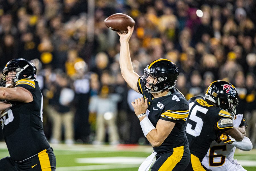 Iowa quarterback Nate Stanley makes a pass during a football game between Iowa and Minnesota at Kinnick Stadium on Saturday, Nov. 16, 2019. The Hawkeyes defeated the Gophers, 23-19. (Shivansh Ahuja/The Daily Iowan)
