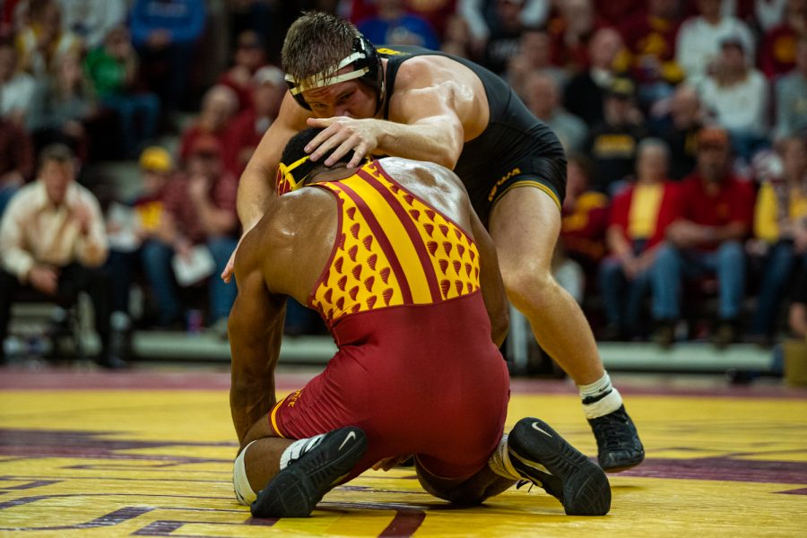 Iowas 184-pound Nelson Brands wrestles Iowa States Sam Colbray during a wrestling dual meet between Iowa and Iowa State at the Hilton Coliseum in Ames on Sunday, November 24, 2019. Brands won by decision, 4-3, and the Hawkeyes defeated the Cyclones, 29-6. (Shivansh Ahuja/The Daily Iowan)