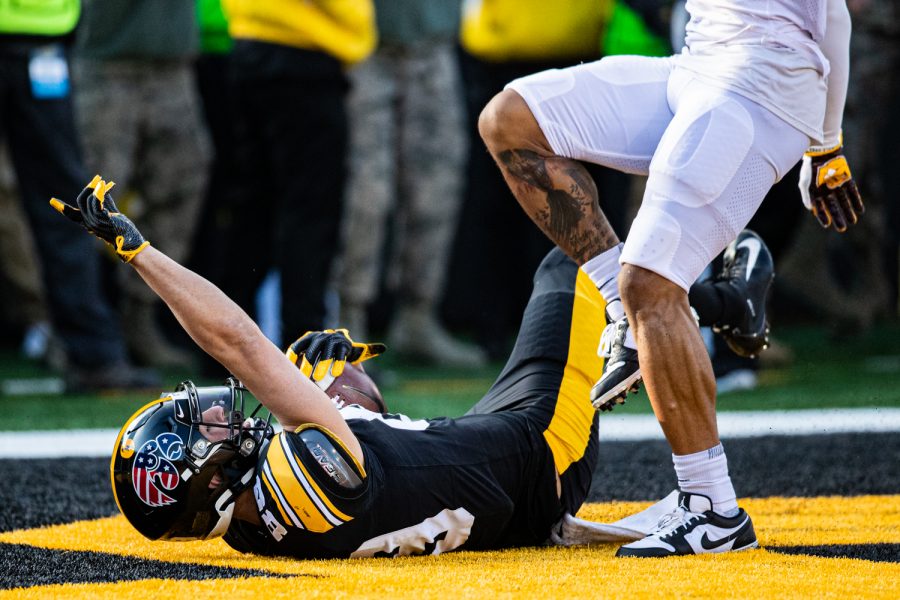 Iowa wideout Nico Ragaini scores a touchdown during a football game between Iowa and Minnesota at Kinnick Stadium on Saturday, Nov. 16, 2019. The Hawkeyes would fail the point-after attempt.