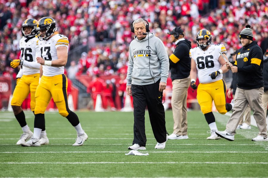 Iowa head coach Kirk Ferentz walks to a huddle during a game against Wisconsin at Camp Randall Stadium on Saturday, November 9, 2019. The Hawkeyes were defeated by the Badgers 24-22. Iowa will stay at 3rd place in the Big Ten west. 