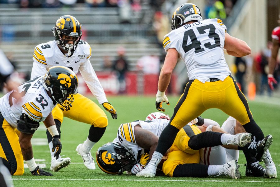 Iowa linebacker Yahweh Jeudy recovers a fumble during a football game between Iowa and Wisconsin at Camp Randall Stadium in Madison on Saturday, November 9, 2019. This led to a Keith Duncan field goal.