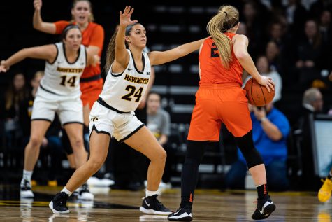 Iowa guard Gabbie Marshall defends against Princetons Carlie Littlefield during a womens basketball game between Iowa and Princeton at Carver-Hawkeye Arena on Wednesday, November 20, 2019. The Hawkeyes defeated the Tigers, 77-75 in overtime.