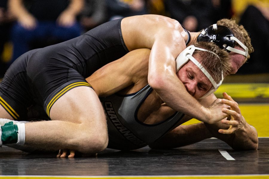 Iowas 157-pound Kaleb Young wrestles UTCs George Carpenter during a wrestling dual-meet between Iowa and Tennessee-Chattanooga at Carver-Hawkeye Arena on Sunday, Nov. 17, 2019. Young won by major decision, 16-6, and the Hawkeyes defeated the Mocs, 39-0.