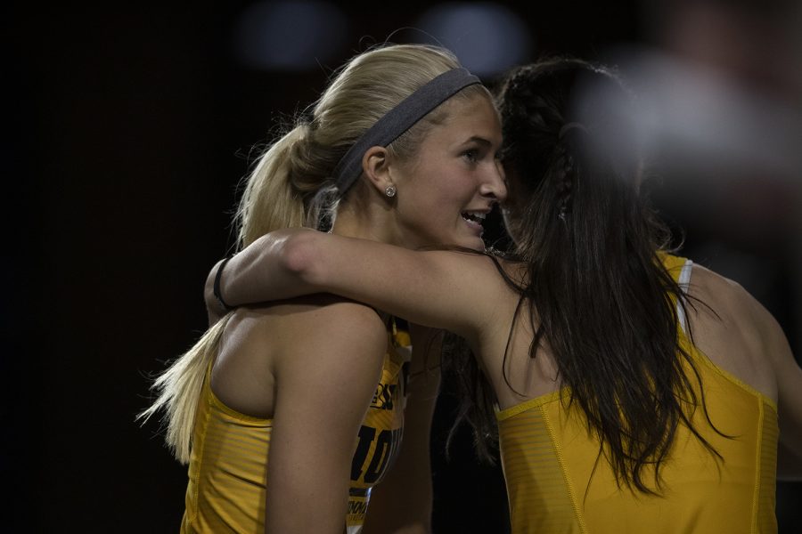 Iowa's Aly Weum and Mallory King congratulate each other on breaking the women's 600m record during the Jimmy Grant Invitational at the University of Iowa Recreation Building on Saturday, Dec. 14, 2019. Weum and King both broke the previous record of 1:32.82 with times of 1:31.48 and 1:31.05, leaving the current record with King.