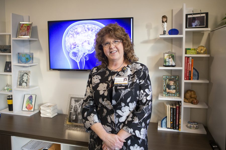 Department of Psychiatry Chair and DEO Dr. Peggy Nopoulos poses for a photo in her office in the Pappajohn Pavilion on Thursday, December 12, 2019. Dr. Nopoulos is conducting research on the neurological disease Huntington’s.