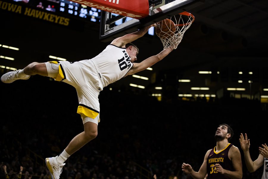 Iowa guard Joe Wieskamp dunks the ball during the mens basketball game against Minnesota at Carver-Hawkeye Arena on Monday, December 9, 2019. The Hawkeyes defeated the Gophers 72-52. Wieskamp had 23 points during the game.