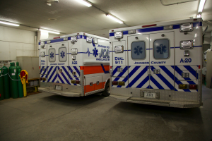 Johnson County ambulances are photographed Thursday, Feb 4 in Iowa City.  Four ambulances are parked tightly in one garage with limited space.  (Eden Hall/The Daily Iowan)