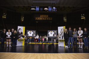 Iowa seniors Emily Bushman and Meghan Buzzerio are recognized before a volleyball match between the University of Iowa and University of Maryland at Carver Hawkeye Arena on Saturday, November 30, 2019.  The Hawkeyes defeated the Terrapins 3-1.