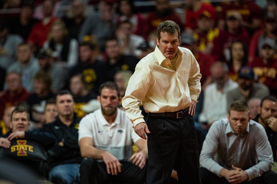 Iowa head coach Tom Brands watches his team compete during a wrestling dual meet between Iowa and Iowa State at the Hilton Coliseum in Ames on Sunday, November 24, 2019. The Hawkeyes defeated the Cyclones, 29-6. 