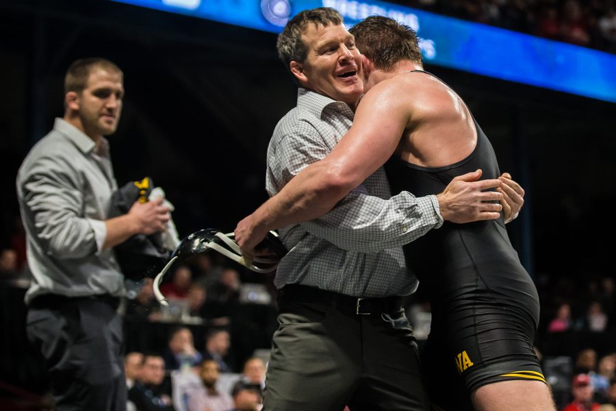 Iowas+197-lb+Jacob+Warner+hugs+head+coach+Tom+Brands+during+the+fourth+session+of+the+2019+Big+Ten+Wrestling+Championships+in+Minneapolis%2C+MN+on+Saturday%2C+March+9%2C+2019.+