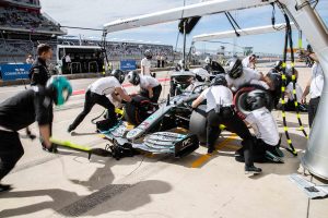 Lewis Hamilton’s crew works on his car at a pit stop during the third practice session for the United States Grand Prix at the Circuit of the Americas on Saturday, Nov. 2, 2019.  [LOLA GOMEZ / AMERICAN-STATESMAN]