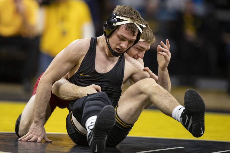 Iowas 125-pound Spencer Lee wrestles Wisconsins Michael Cullen during a wrestling match between No.1 Iowa and No. 6 Wisconsin at Carver-Hawkeye Arena on Sunday, Dec. 1, 2019. Lee won by technical fall in 3:13.
