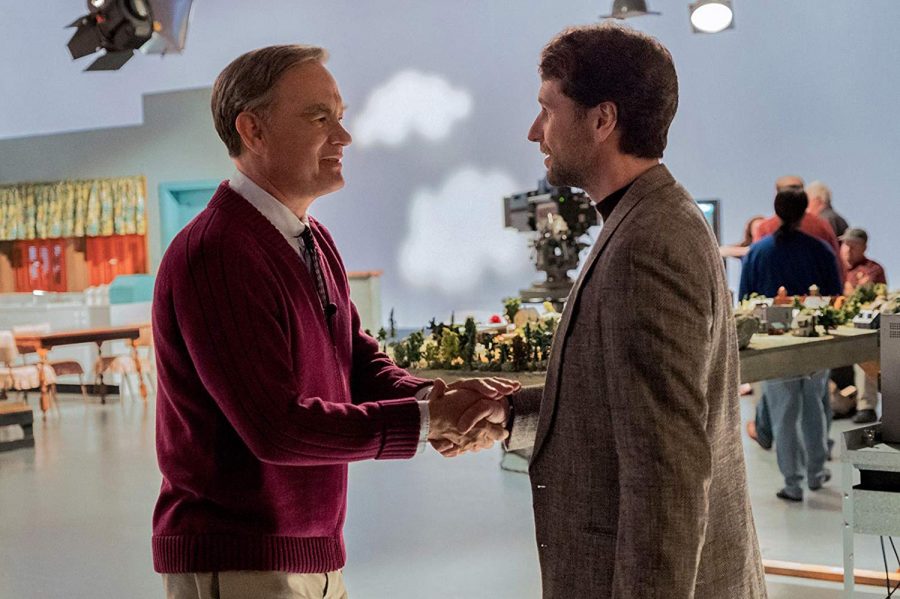 Reassuring television host Fred Rogers (Tom Hanks) meets skeptical journalist Lloyd Vogel (Matthew Rhys) in director Marielle Heller's unconventional biopic, "A Beautiful Day in the Neighborhood." [Lacey Terrell/Sony Pictures/TNS]