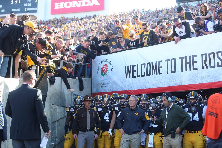Iowa fans cheer for the team as they prepare to run out of the tunnel before the Rose Bowl Game in Rose Bowl Stadium in Pasadena, California on Friday, Jan. 1, 2016. Stanford defeated Iowa, 45-16. 