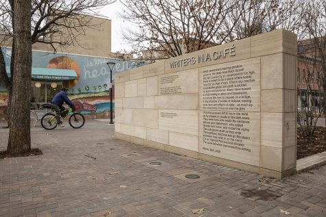 An installed art piece displays a poem by artist Marvin Bell on December 8, 2019 in the Iowa City Pedestrian Mall. Iowa City was the first in the United States to be recognized as a City of Literature by UNESCO. 