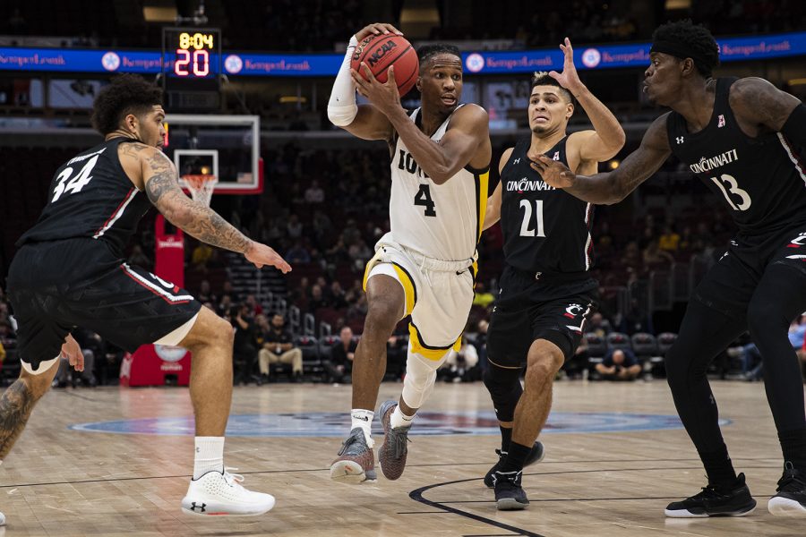 Iowa guard Bakari Evelyn drives to the hoop during a menÕs basketball match between Iowa and Cincinnati at the United Center in Chicago on Saturday, Dec. 21, 2019. (Shivansh Ahuja/The Daily Iowan)