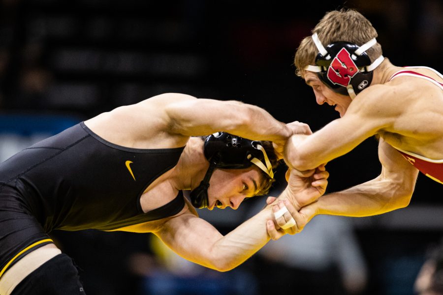 Iowa%E2%80%99s+125-pound+Spencer+Lee+wrestles+Wisconsin%E2%80%99s+Michael+Cullen+during+a+wrestling+match+between+No.1+Iowa+and+No.+6+Wisconsin+at+Carver-Hawkeye+Arena+on+Sunday%2C+Dec.+1%2C+2019.+Lee+won+by+technical+fall+in+3%3A13%2C+and+the+Hawkeyes+defeated+the+Badgers%2C+32-3.