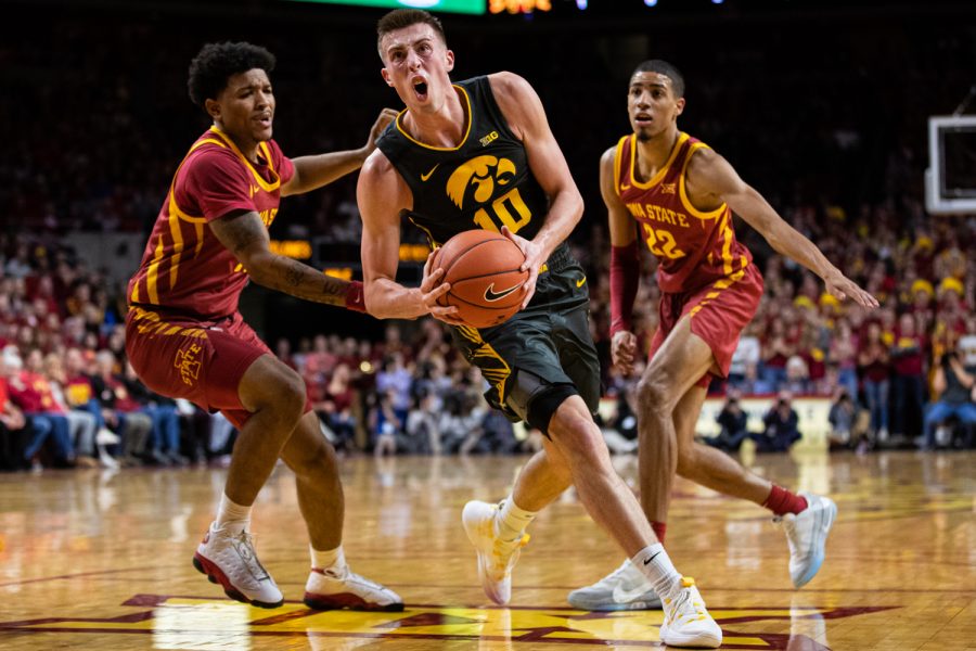 Iowa+guard+Joe+Wieskamp+drives+to+the+rim+during+a+men%C3%95s+basketball+match+between+Iowa+and+Iowa+State+at+Hilton+Coliseum+on+Thursday%2C+Dec.+12%2C+2019.+Wieskamp+finished+with+13+points.