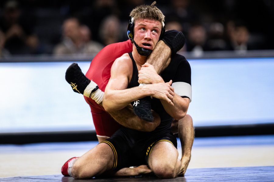 Iowa’s 141-pound Max Murin wrestles Wisonsin’s Tristan Moran during a wrestling match between No.1 Iowa and No. 6 Wisconsin at Carver-Hawkeye Arena on Sunday, Dec. 1, 2019. Murin won by decision, 3-2, and the Hawkeyes defeated the Badgers, 32-3.