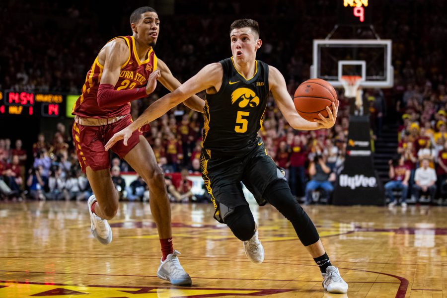 Iowa guard CJ Fredrick drives to the net during a menÕs basketball match between Iowa and Iowa State at Hilton Coliseum on Thursday, Dec. 12, 2019. Fredrick played for 32:15.