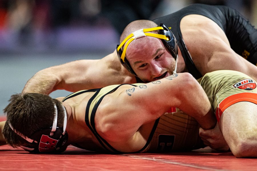 Iowa’s 165-pound Alex Marinelli wrestles Wisconsin’s Joshua Otto during the first session of the 57th Annual Ken Kraft Midlands Championships at the Sears Centre in Hoffman Estates, IL, on Sunday, Dec. 29, 2019. Marinelli won by a fall in 1:17.