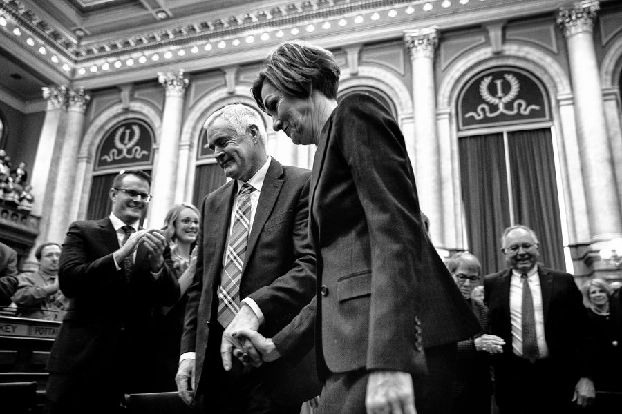 Gov. Kim Reynolds exits with her husband, First Gentleman, Kevin Reynolds, following the Condition of the State address at the Iowa State Capitol on Tuesday, January 14, 2020. Gov. Kim Reynolds discussed initiatives such as tax cuts, mental health funding, and workforce training.