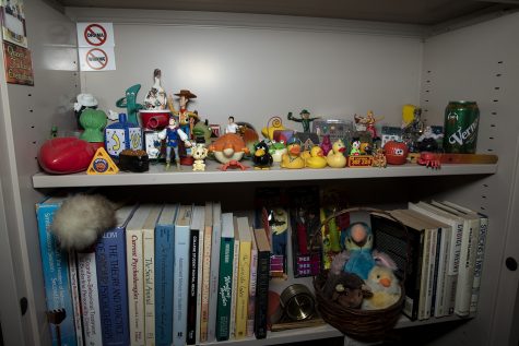 Pieces of University of Iowa Counseling Services Director Barry Schreiers office collection are seen on December 12, 2019. Schreier recently was awarded the Association of University and College Counseling Center’s President’s Award for Meritorious Service in the National Field of Campus Mental Health. 